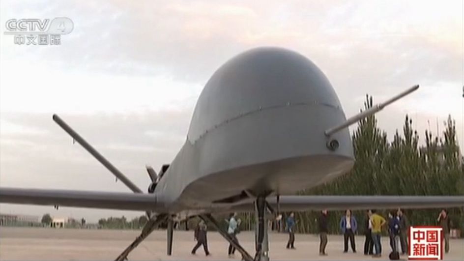 The screen shot from the video of CNTV shows that one of China's biggest UAV (UAV，Unmanned Aerial Vehicle) has completed its maiden flight successfully. (Photo source: CNTV) 