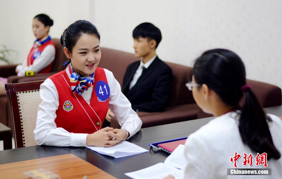 Charming girls vie for flight attendant jobs
