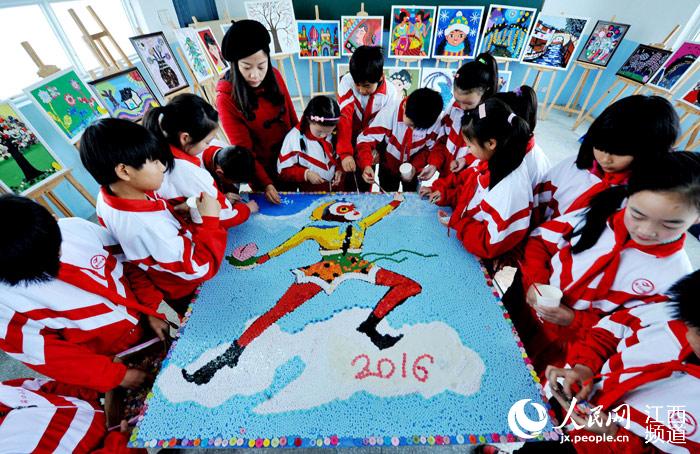 Left behind children welcome the New Year by ‘painting’ monkey with buttons
