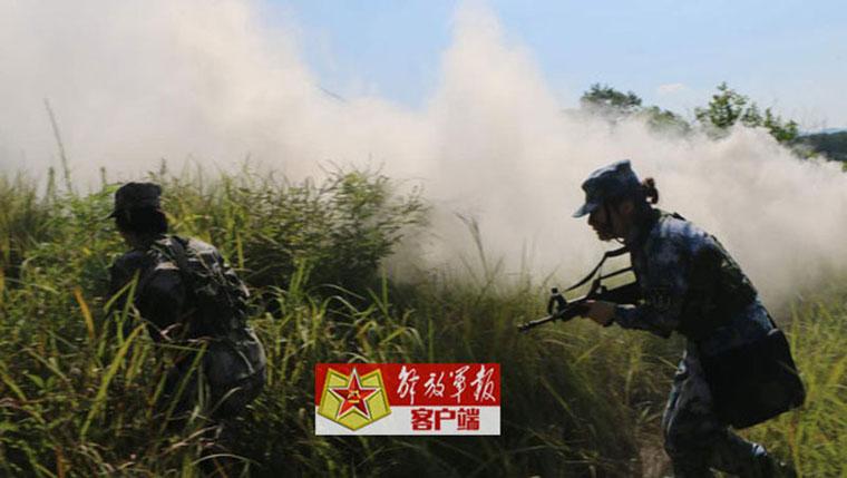 Versatile female soldiers in military camp
