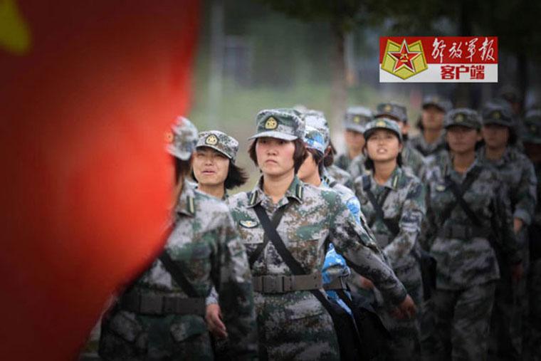 Versatile female soldiers in military camp

