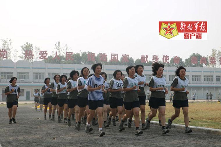 Versatile female soldiers in military camp
