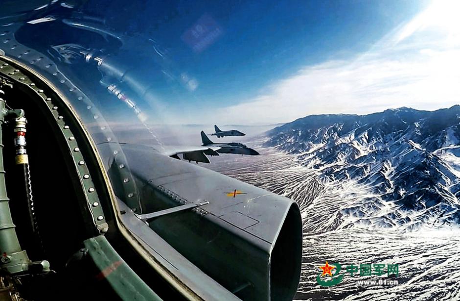 Stunning photos of China's fighter jets in drill