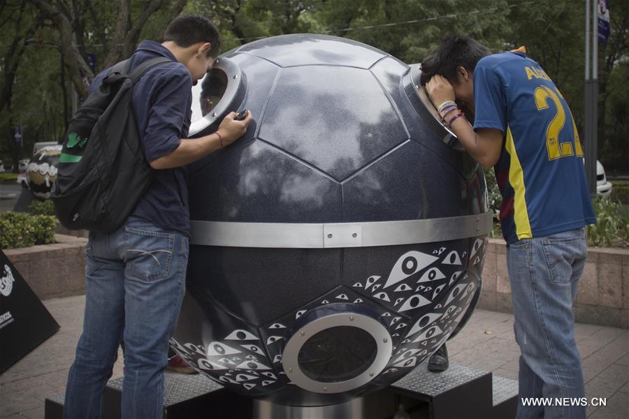 64 sculptures in shape of soccer ball exhibited in Mexico