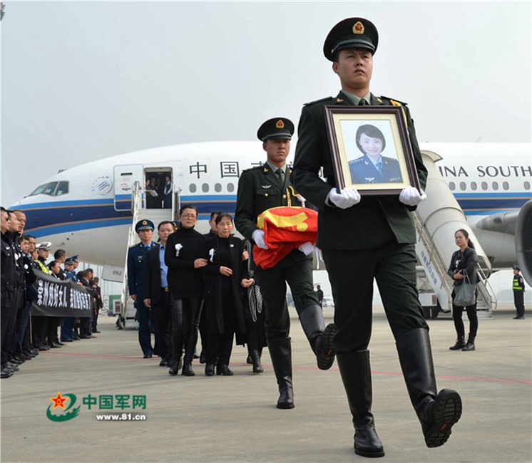 Ashes of fallen pilot placed in hometown cemetery