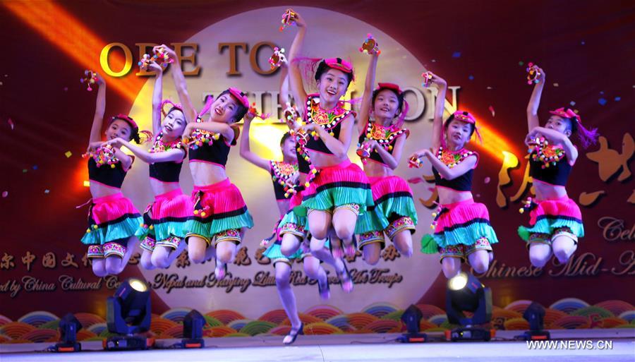 Children dance to celebrate Chinese Mid-Autumn Festival in Nepal