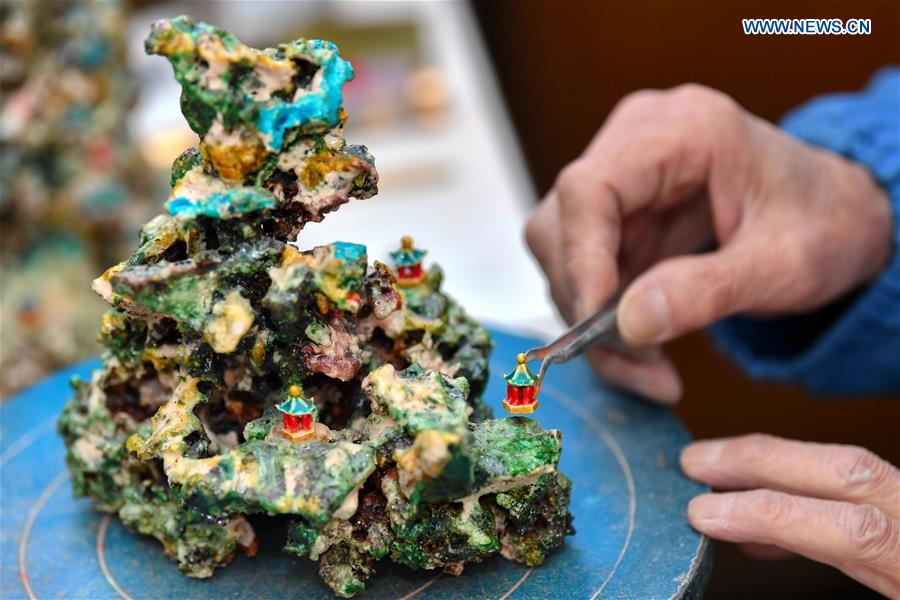 Inheritor of coloured glaze firing skill transforms waste into artwork in China's Shanxi
