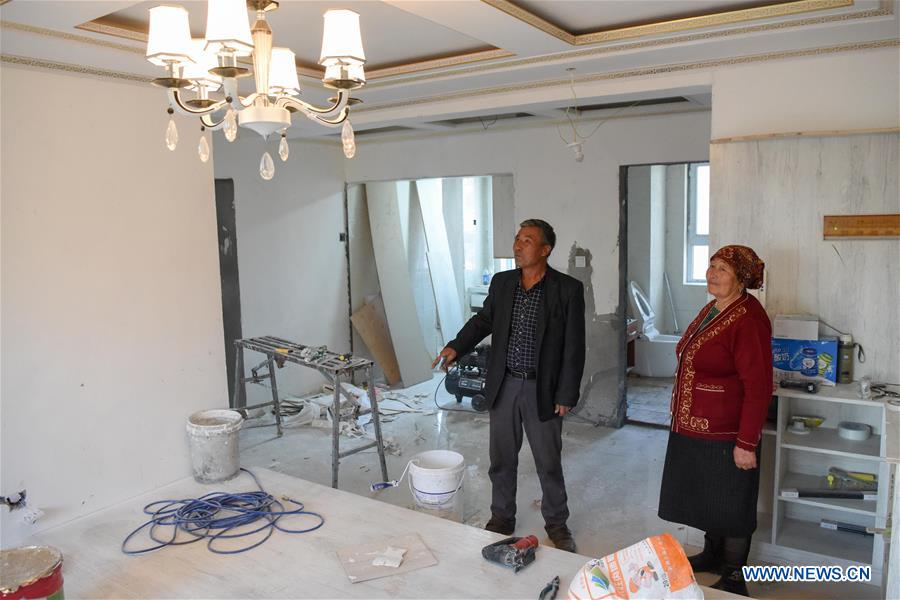 Construction work of 20 residential buildings completed in Axili, Xinjiang