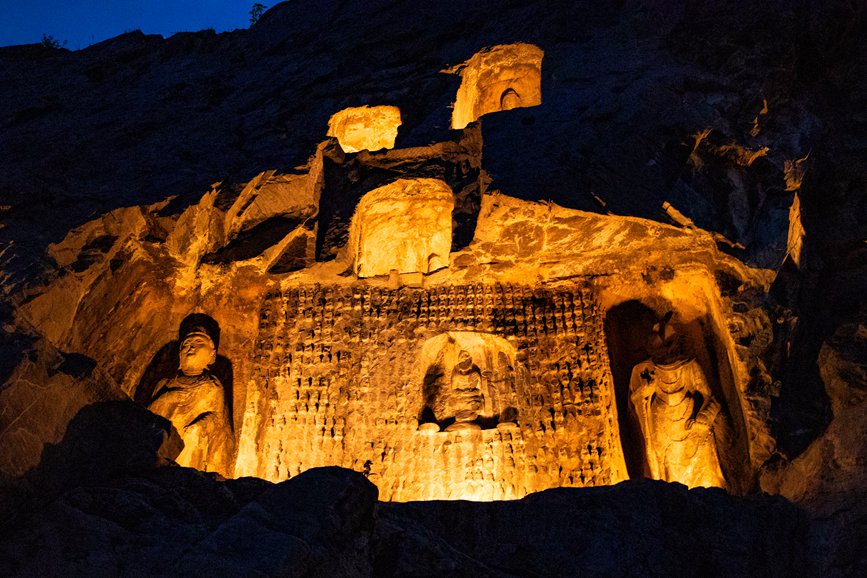 Grottoes in central China welcome vistors at dusk