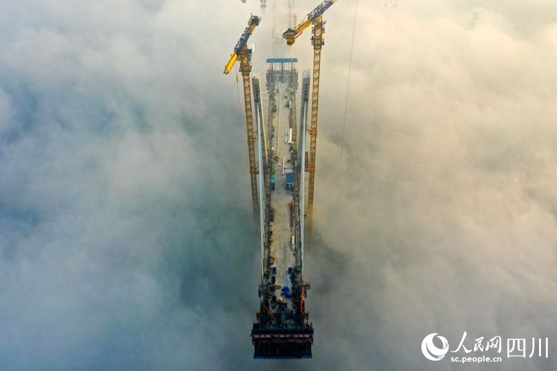 A glimpse into construction of super bridge in the clouds in SW China