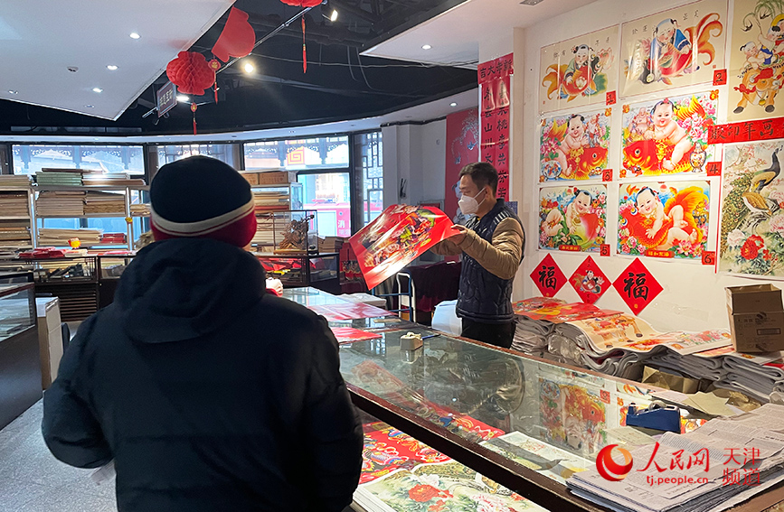 In pics: Commercial street in N China's Tianjin immersed in festive atmosphere