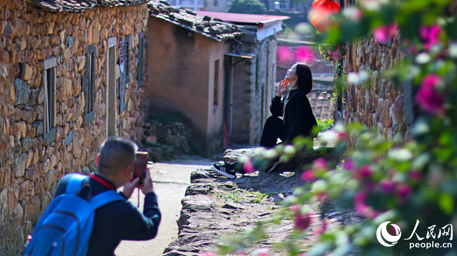 'Oil painting mountain village' beckons spring tourists in SE China's Fujian