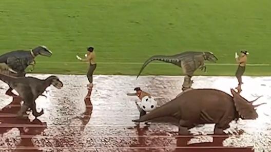 Jurassic pitch: Dino parade roars at rainy football match