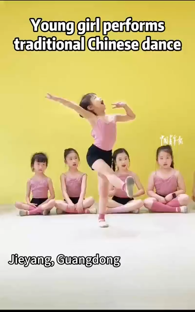 Young girl performs traditional Chinese dance
