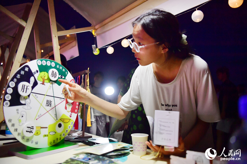 Traditional Chinese medicine-themed night fair offers immersive educational, recreational experiences in E China's Jiangxi