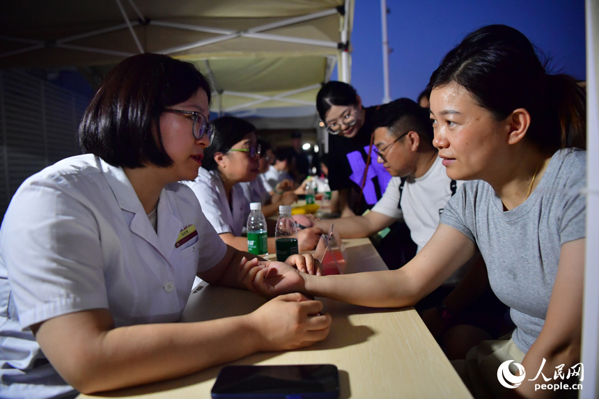Traditional Chinese medicine-themed night fair offers immersive educational, recreational experiences in E China's Jiangxi