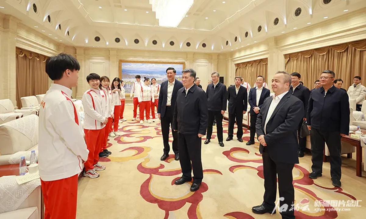 A team of 11 Chinese champions from the Paris Olympics meets local officials in Northwest China's Xinjiang Uyghur Autonomous Region, on November 25, 2024. Photo: Official WeChat account of Xinjiang government