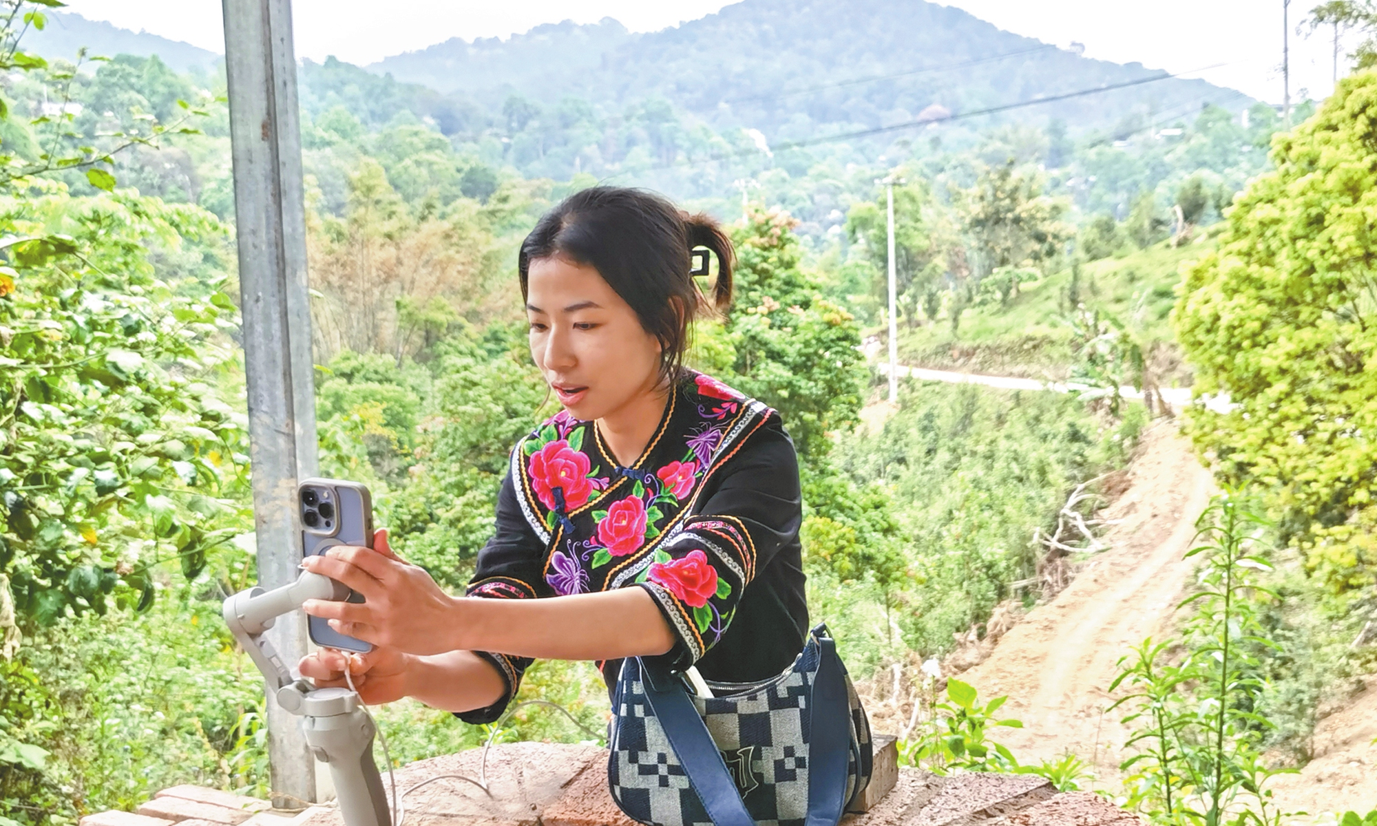 Yanzi, a content creator from Lufeng county, Chuxiong Yi Autonomous Prefecture, Southwest China's Yunnan Province, makes videos to promote local products.  Photo: Courtesy of Yanzi