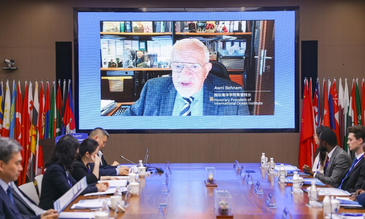 Awni Behnam, honorary president of the International Ocean Institute, delivers a video speech at the meeting held on June 8, 2025, at Shanghai Maritime University. Photo: Courtesy of Shanghai Maritime University