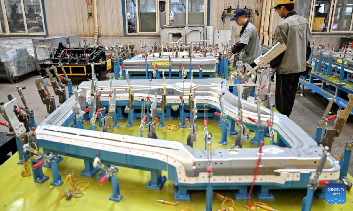 Technicians check product quality at a mold company in Botou, north China's Hebei Province, Sept. 24, 2025. In recent years, as one of the old industry bases in Hebei, Botou has witnessed its manufacturing processes converted to green and environmental friendly ones. At present, the city is home to over 300 casting companies, boasting an annual output of 26 billion yuan (about 3.65 billion U.S. dollars) by clustered players here. (Xinhua/Mu Yu)