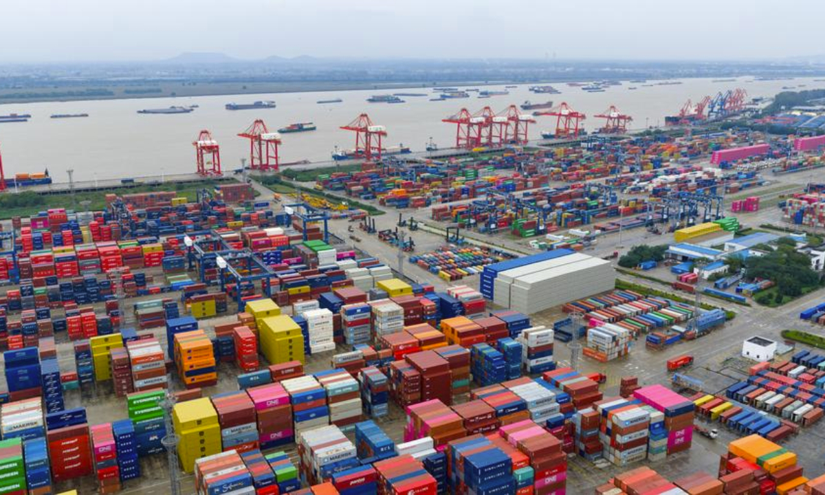 An aerial drone photo shows the view of a container terminal of Nanjing Port in east China's Jiangsu Province, Oct. 19, 2025. (Photo by Yang Suping/Xinhua)